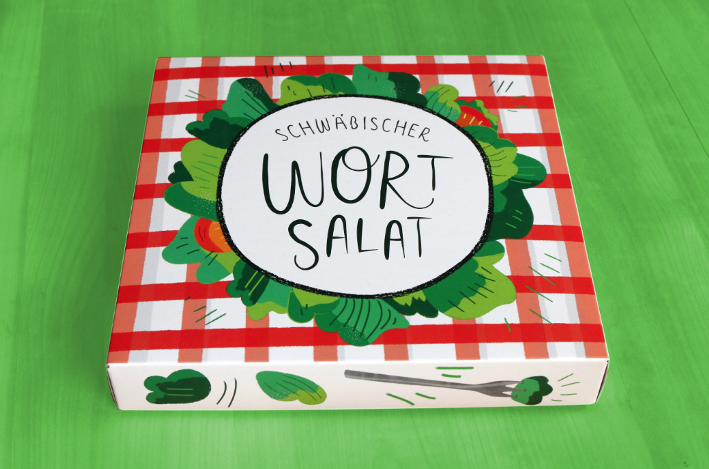 Die Schachtel des Schwäbischen Wortsalats auf gründem Grund.